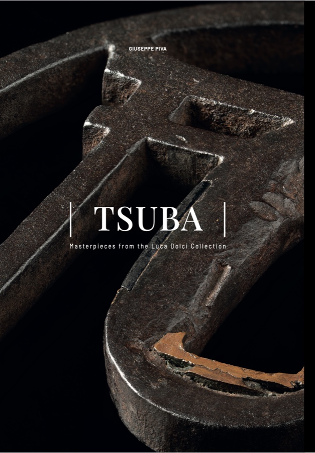 Cover of TSUBA — Masterpieces from the Luca Dolci Collection, showing a macro photograph of a rusted iron tsuba